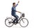 Young guy with a football riding a bike and gesturing happiness