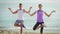 Young guy and girl practising yoga poses