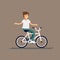 Young guy having fun riding bicycle with backpack . Kid having free time on weekend. Summer break outdoor recreation for