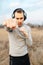 A young guy in headphones is doing sports training