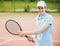 Young Guy in Shirt Ready to Serve on Tennis Court.