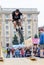 Young guy is showing extreme jumps on a skate stage