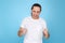 young guy in t-shirt standing with boxing gesture