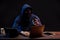 Young hacker male use laptop to gain unauthorized access to data