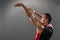 Young handsome African man playing basketball