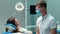 Young handsome dentist in medical blue gloves , mask and glasses talks to beautiful patient woman before starting