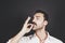 Young handsome man with beard and mustache studio portrait