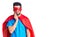 Young handsome man with beard wearing super hero costume touching mouth with hand with painful expression because of toothache or