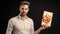 young handsome man in office shirt hold present box, business reward