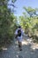 Young handsome man travel in mountains, caucasian male traveler in Provence in Vaucluse, France