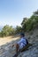 Young handsome man travel in mountains, caucasian male traveler in Provence in Vaucluse, France