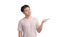 Young handsome man wearing a casual t-shirt standing over white background approving doing positive gestures with his hand,