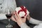 Young handsome man in white shirt giving present to his girlfriend while have romantic dinner