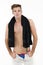 Young handsome model with black towel around neck