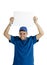 Young handsome smiling guy holding up white place card