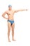 Young handsome swimmer pointing right with his hand