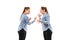 Young handsome woman arguing with herself on white studio background.