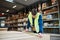 Young handyman working in a warehouse