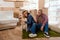 young happy african american family with labrador dog moving to