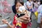 Young happy Asian girl enjoying her soft cream, Japanese ice cream