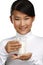 Young happy asian woman drink fresh milk