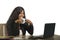 Young happy and attractive black afro American business woman working at office computer desk smiling successful posing corporate