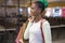 Young happy and beautiful afro American girl at buying shopping mall - lifestyle portrait of millennial black girl enjoying