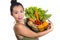 Young happy and beautiful Asian Korean woman holding basket full of fresh vegetables and fruits smiling cheerful  in healthy
