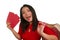 Young happy and beautiful Asian woman in red dress smiling cheerful holding shopping bags as excited spending money after