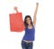 Young happy and beautiful hispanic woman holding red shopping bag smiling excited isolated on white