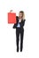 Young happy beautiful woman in business suit in excited face expression holding red shopping bag