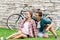 Young and happy couple chilling in park.