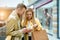 Young happy couple looking store in the Net