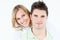 Young happy couple standing over white background