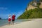 Young happy couple on tropical beach at summer vacation. Thailand