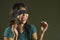 Young happy and cute blindfolded Asian Korean teenager girl excited playing dangerous internet viral challenge on dark