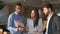 Young happy diverse professional team business people standing in office.