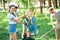 young happy friends planting new trees