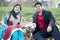 Young Happy Indian Couple Posing With Elephant