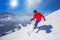 Young happy man skiing in Lenzerheide ski resort, Switzerland.