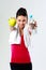 Young happy sport woman with apple and bottle of water