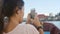 Young Happy Tourist Girl Sails on a Boat on River and Taking Video on Mobile Phone. Bangkok, Thailand. 4K, Slow Motion.