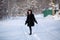 Young happy woman portrait, at snowy winter forest.