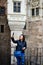 Young happy woman taking a selfie at Corvin Castle, Romania