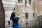 Young happy woman taking a selfie at Corvin Castle, Romania