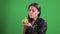 Young health-conscious woman eats an apple