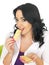 Young Healthy Attractive Woman Eating Thin Mixed Dried Fruit Bars