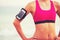 Young Healthy Fitness Woman with Smart Phone