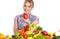 Young healthy woman with fruits and vegetables.