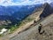 A young hiker exploring the Rocky Mountains on a backcountry hike along the spectacular Northover Ridge trail in Kananaskis